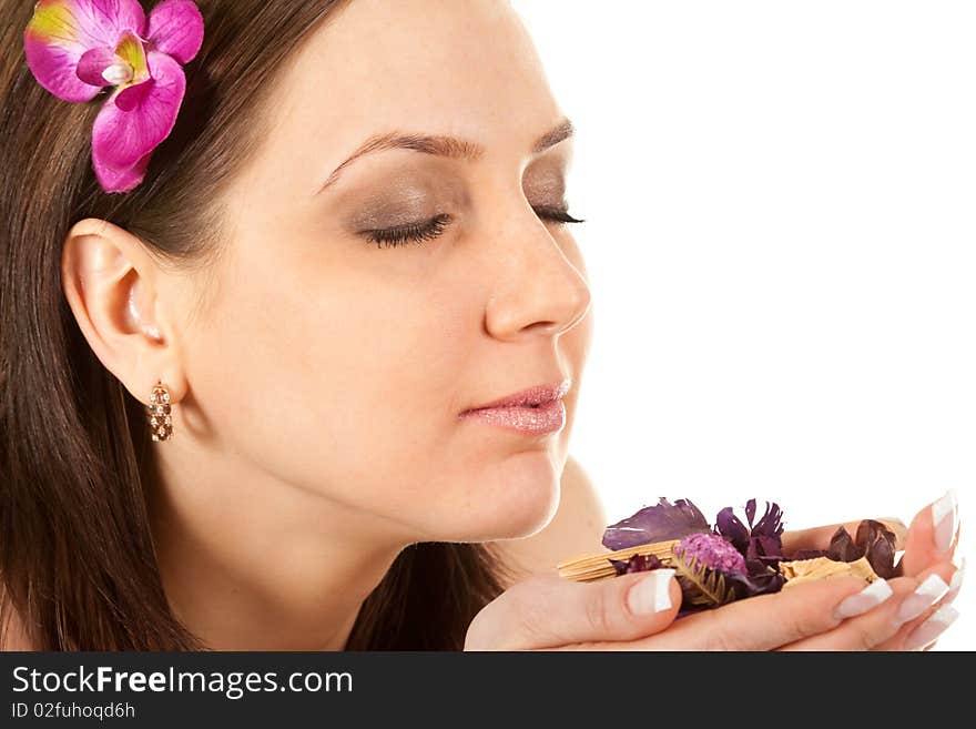 Beautiful woman with flower in her hairs at spa. Beautiful woman with flower in her hairs at spa