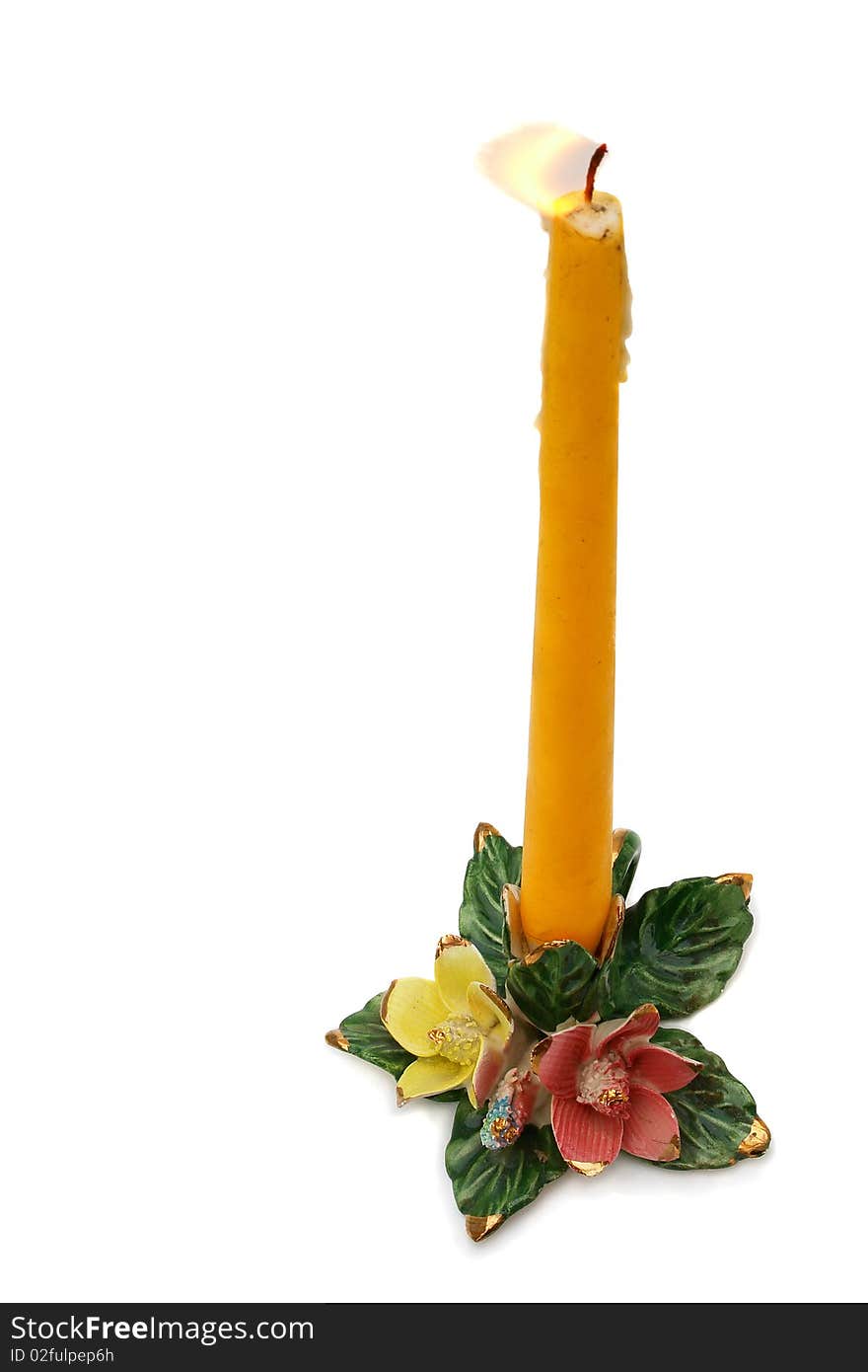 Burning Candle In Candlestick