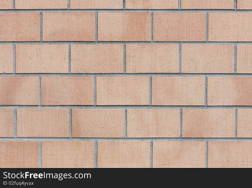 Modern bright brick wall at a construction site. Modern bright brick wall at a construction site.