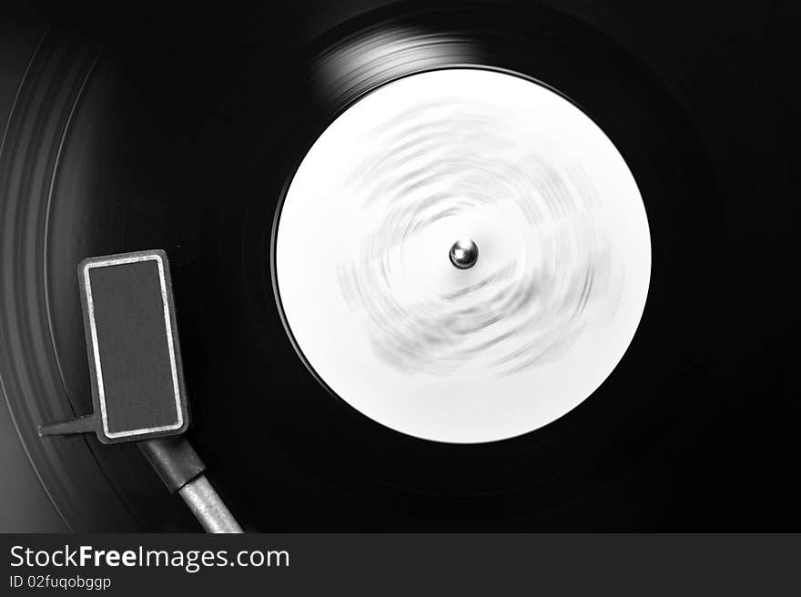 Vinyl record spinning on turntable close up. Vinyl record spinning on turntable close up