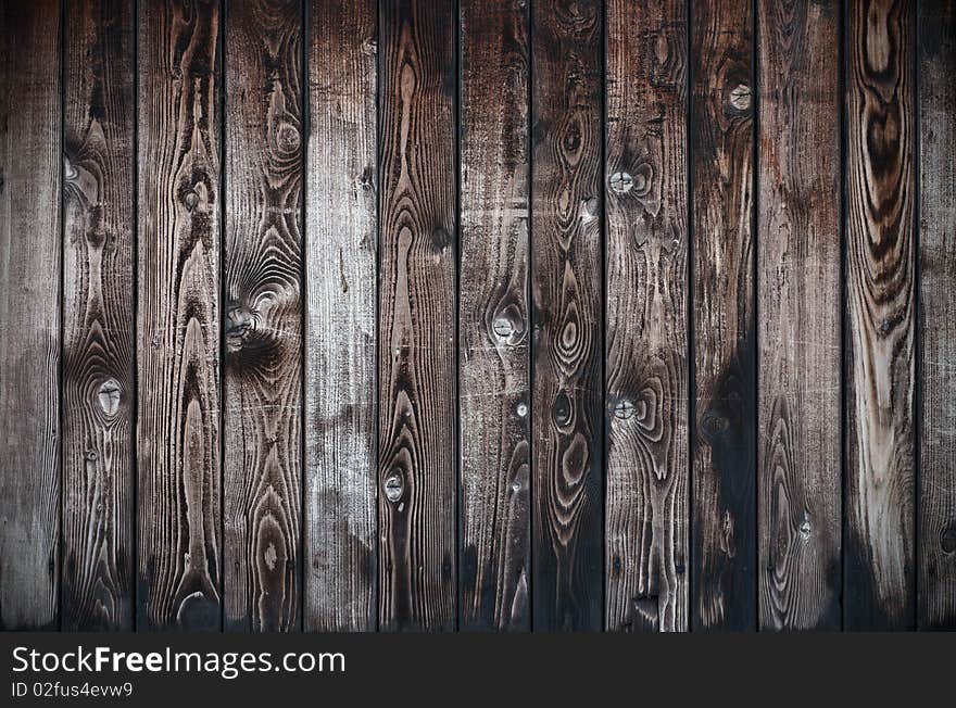 Weathered wooden background with vertical planks. Weathered wooden background with vertical planks.