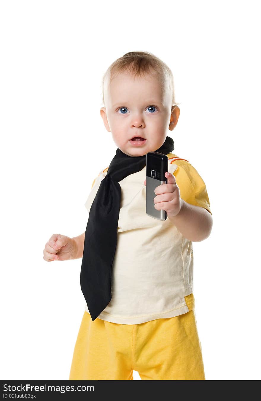 Little boy with mobile phone. Isolated on white