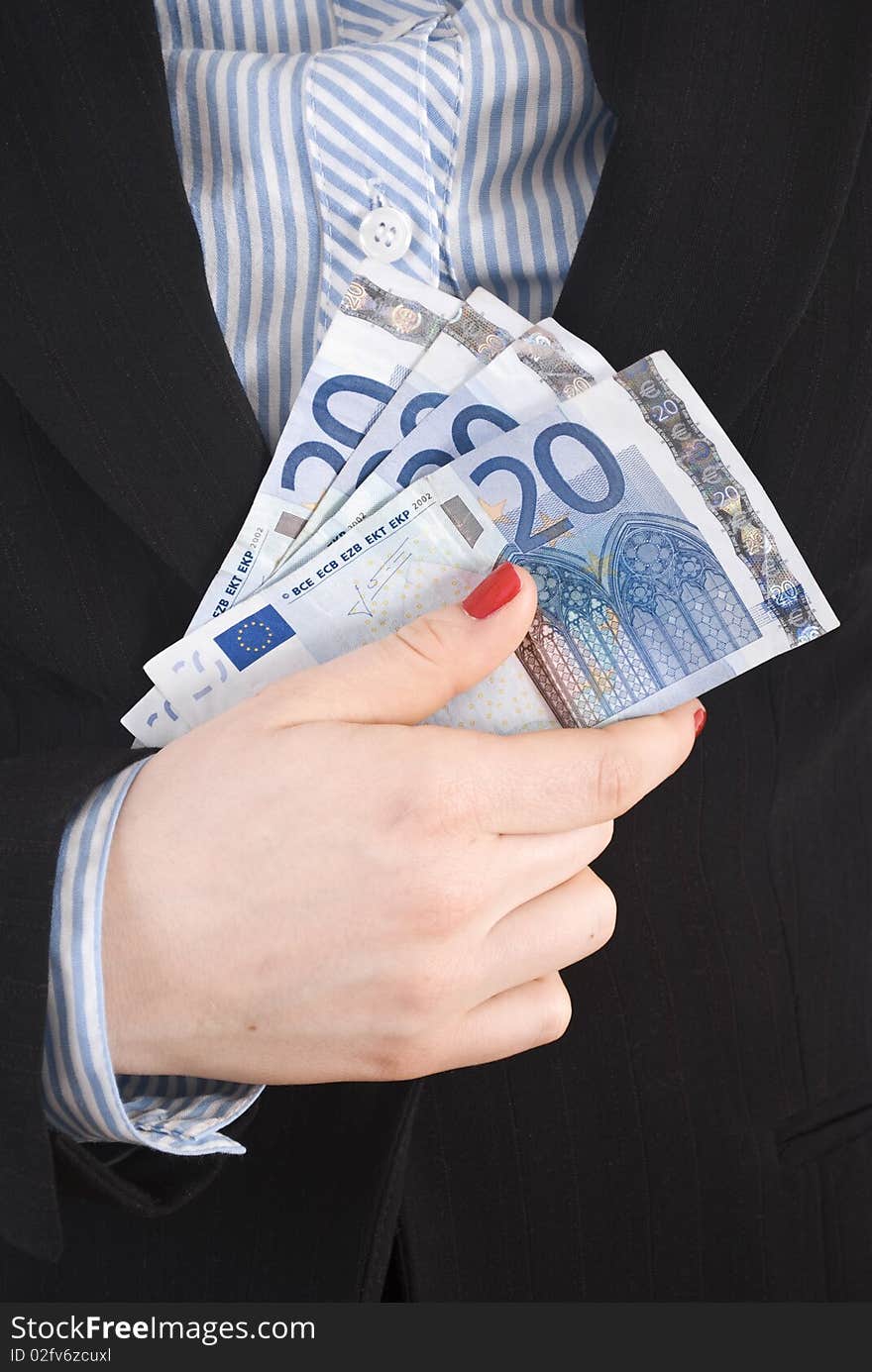 Young businesswoman holding euro notes