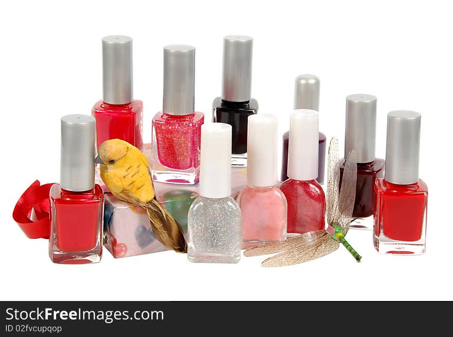 Some nail polishes on a white background