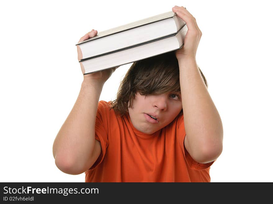 Scared teenager holds some books over head isolated in white