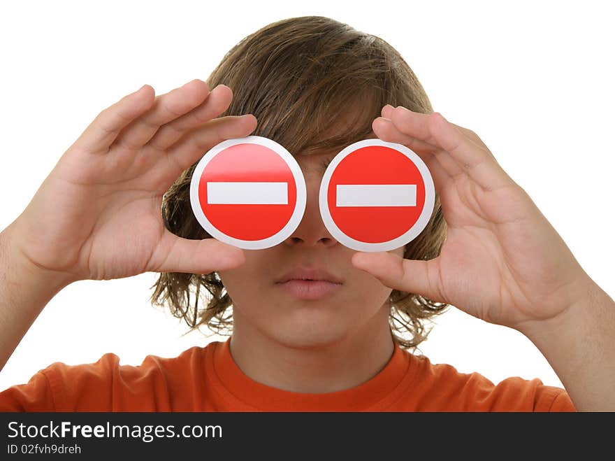 Teenager holds prohibiting signs before eyes isolated in white