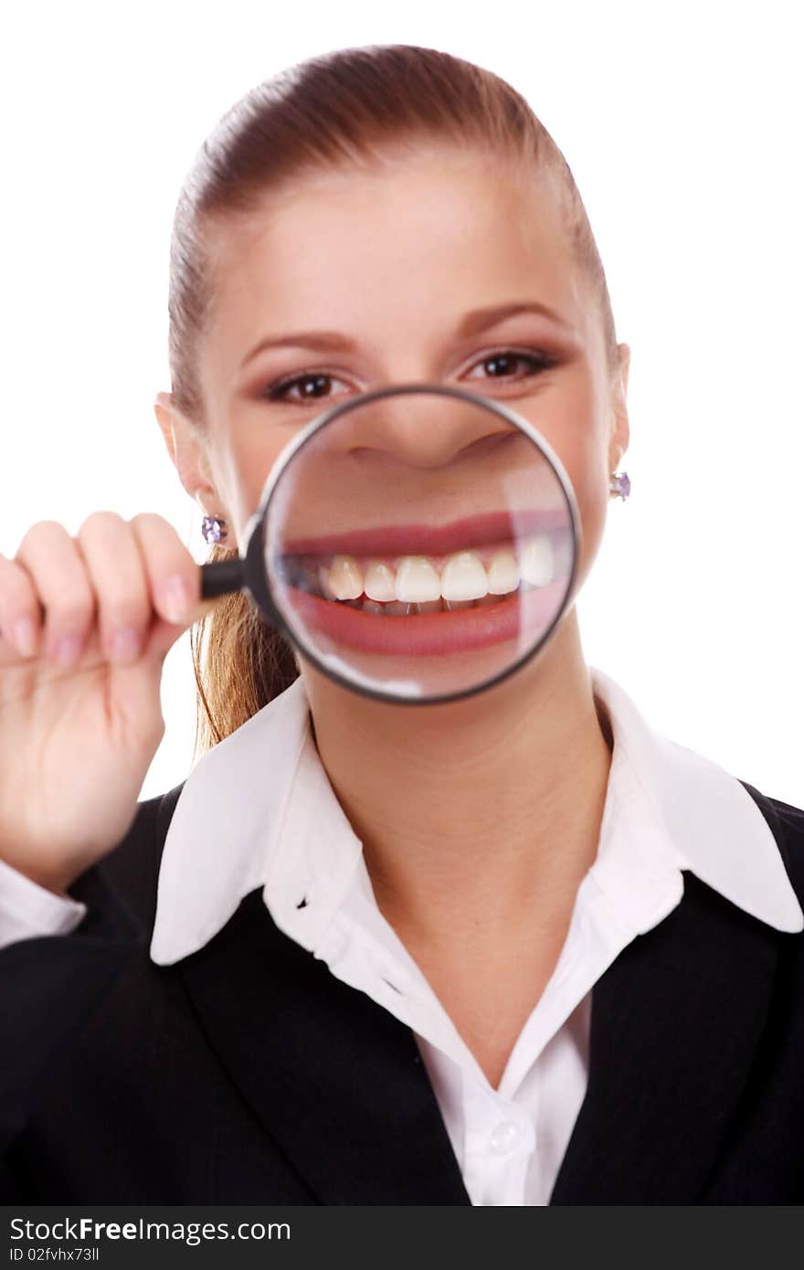 Portrait of young businesswoman with magnifying glass