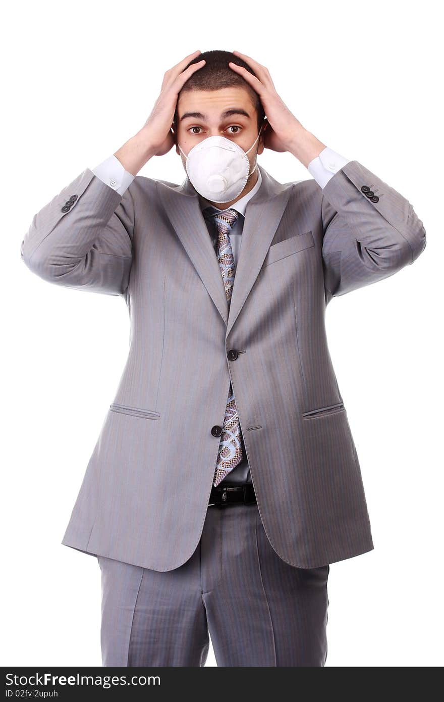 Young man in white respirator and grey suit