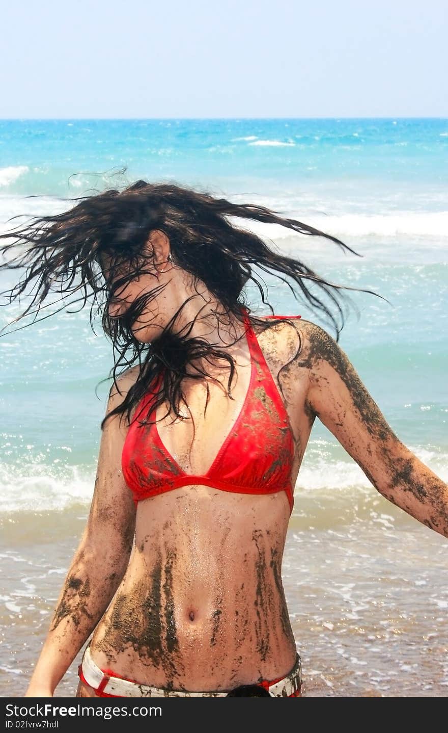 Dirty girl on beach