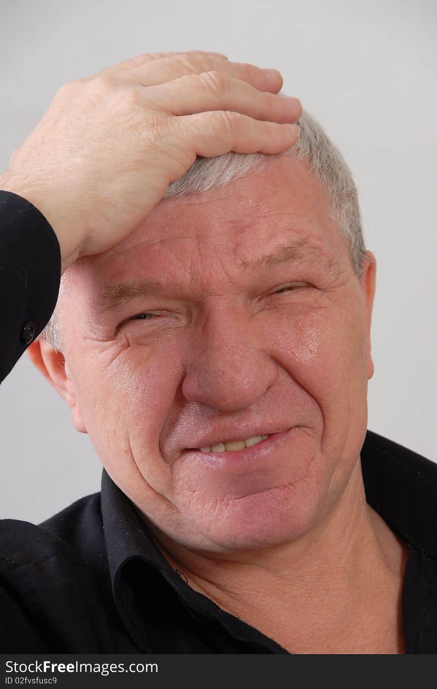 The elderly man in good mood and a black shirt. The elderly man in good mood and a black shirt.