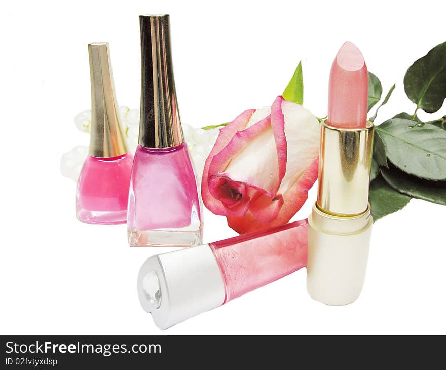 Lipstick rose nail polishers and lip gloss make up composition. Lipstick rose nail polishers and lip gloss make up composition