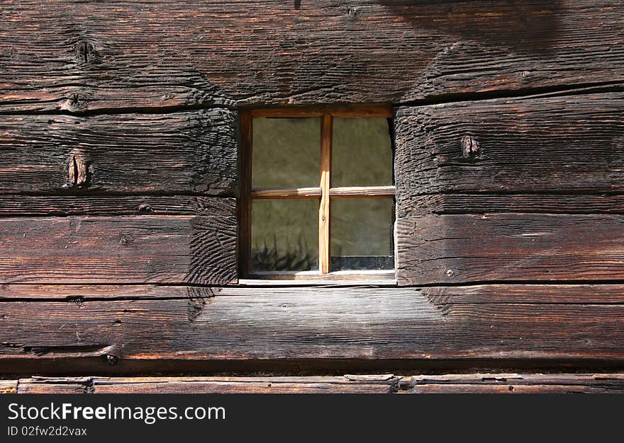 Rustic window on an old wooden house. Rustic window on an old wooden house