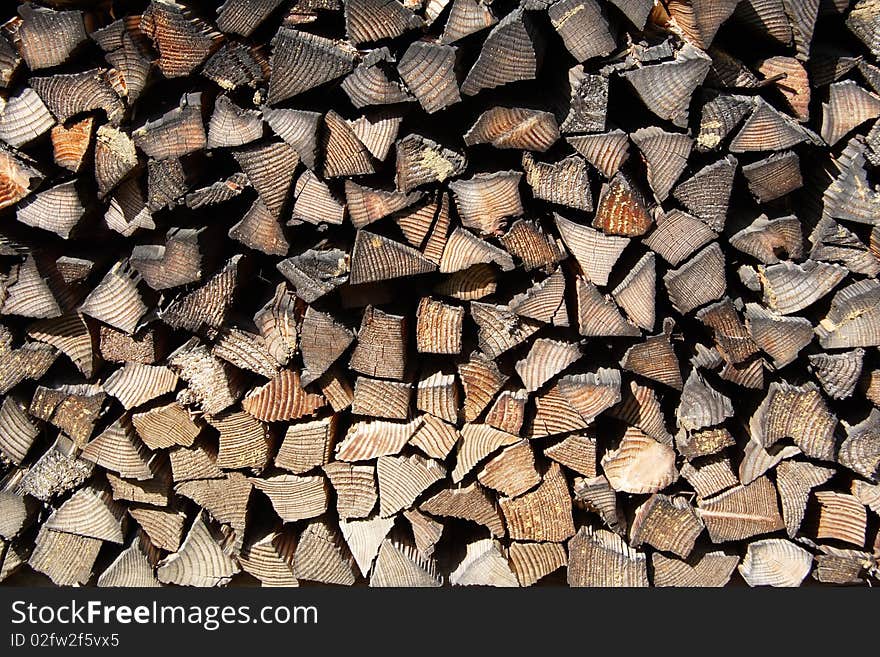 Close up view of stacked old firewood. Close up view of stacked old firewood