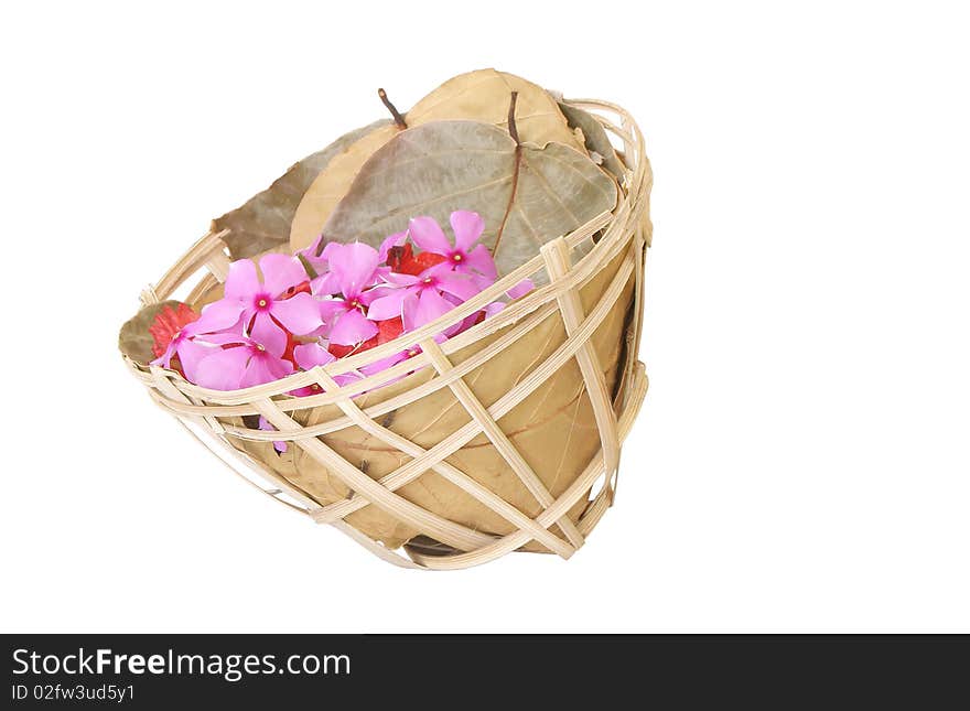 Isolated handmade flower basket made of bamboo and leaves. Isolated handmade flower basket made of bamboo and leaves