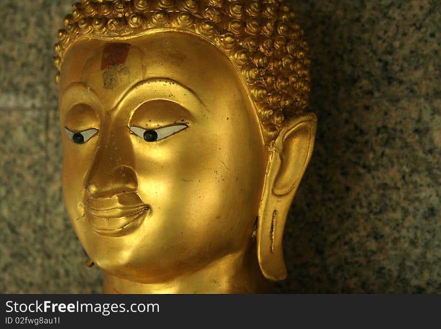 Buddha's  face at Wat Prayurawongsawas, Bangkok, Thailand