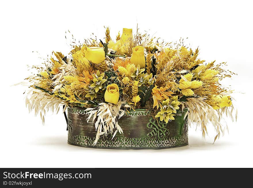 A flower arrangement to decorate a table. A flower arrangement to decorate a table