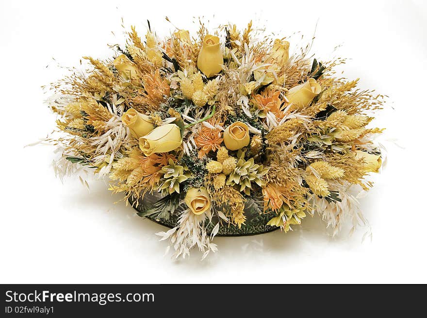 A flower arrangement to decorate a table. A flower arrangement to decorate a table