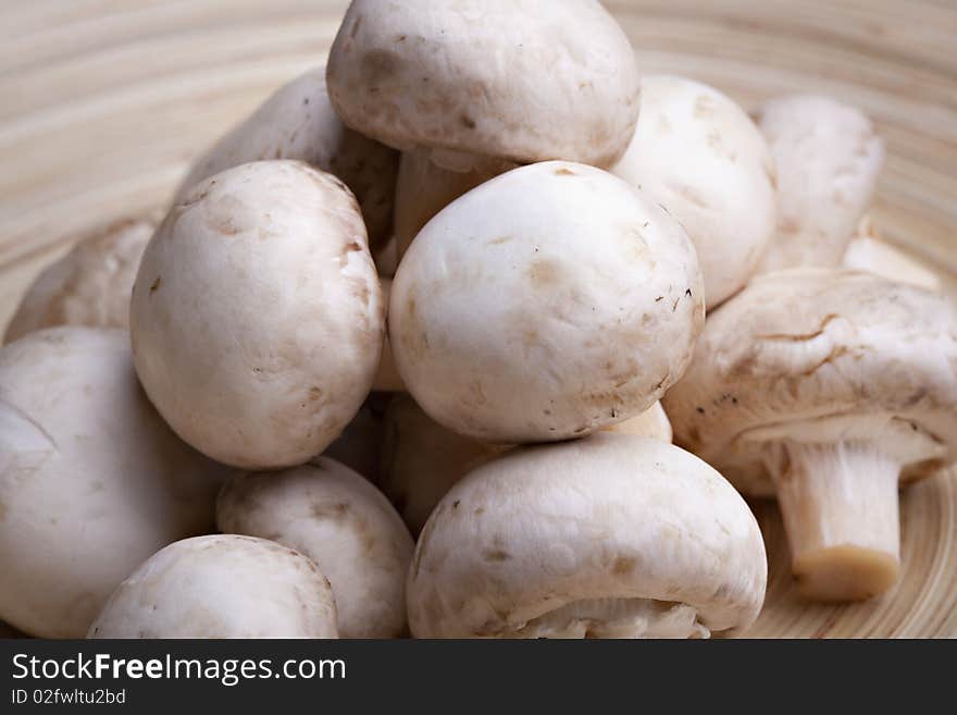 Edible white button or champignon mushrooms, healthy organic food