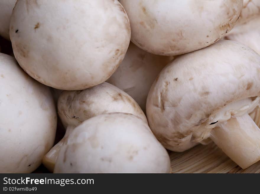 Edible white button or champignon mushrooms, healthy organic food