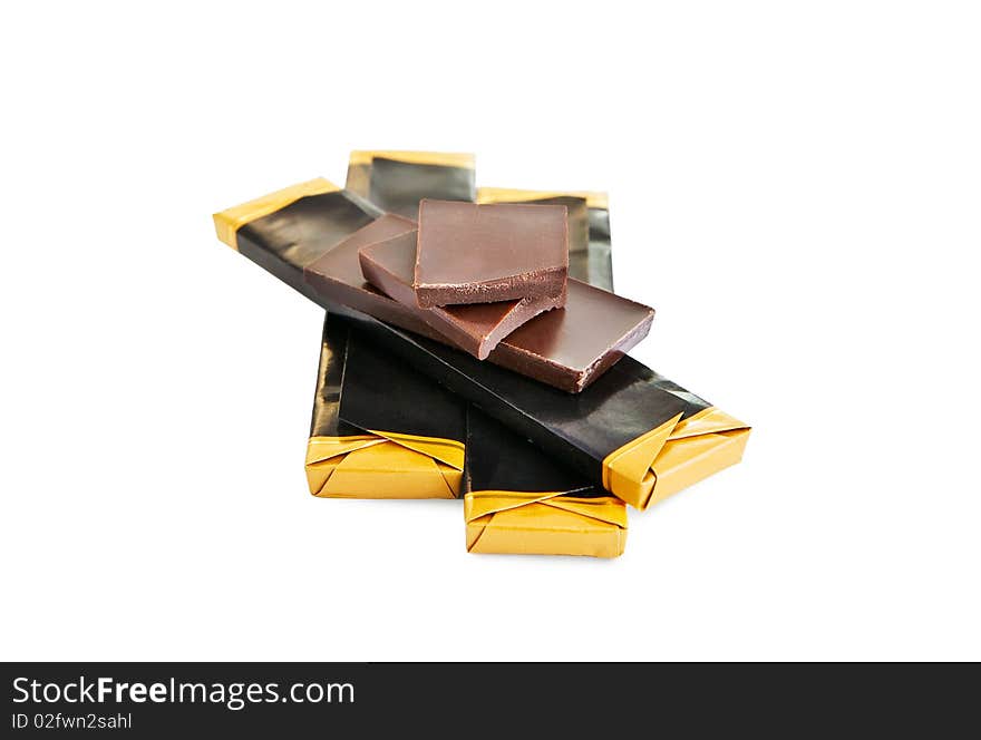 Broken chocolate bar isolated on white with clipping path. Broken chocolate bar isolated on white with clipping path