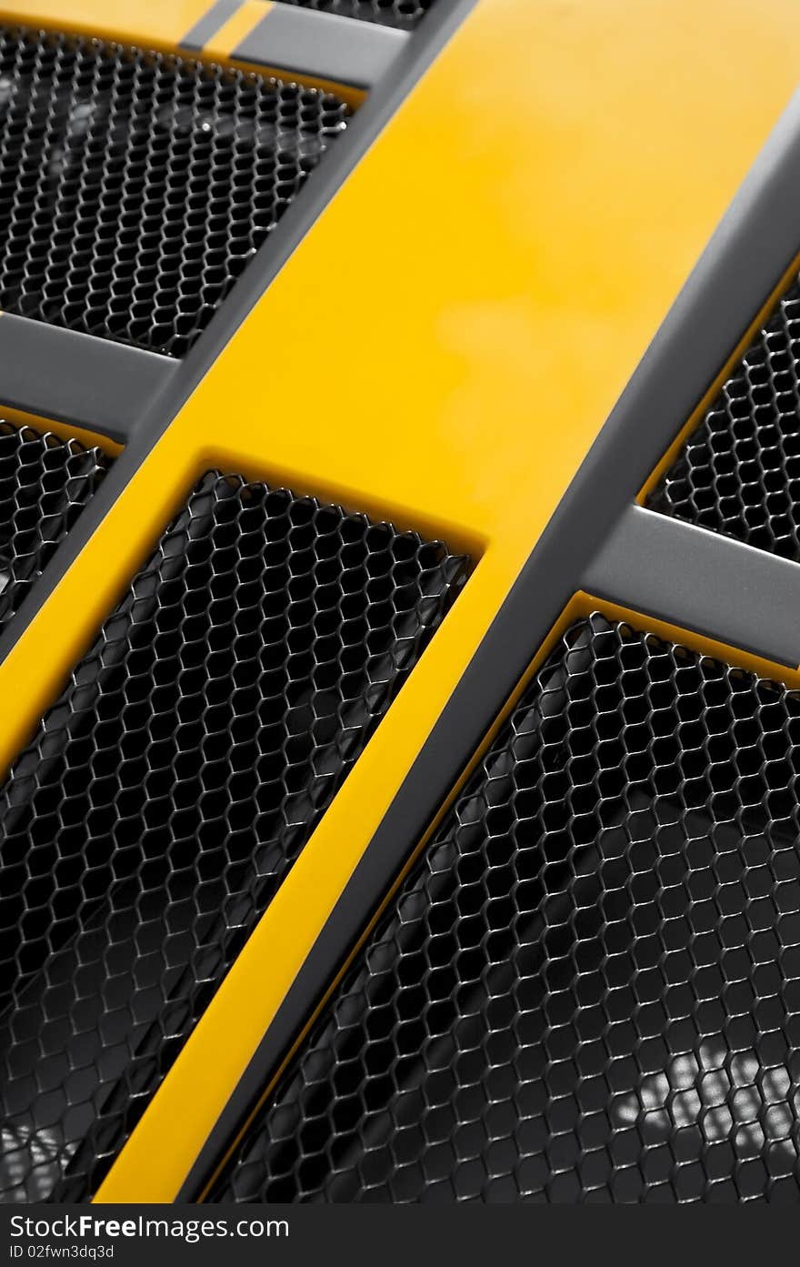 Yellow and black luxury sports car engine grille abstract. Yellow and black luxury sports car engine grille abstract