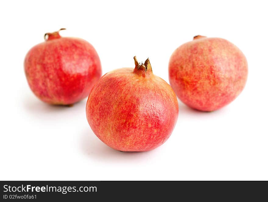 Pomegranates isolated on white background