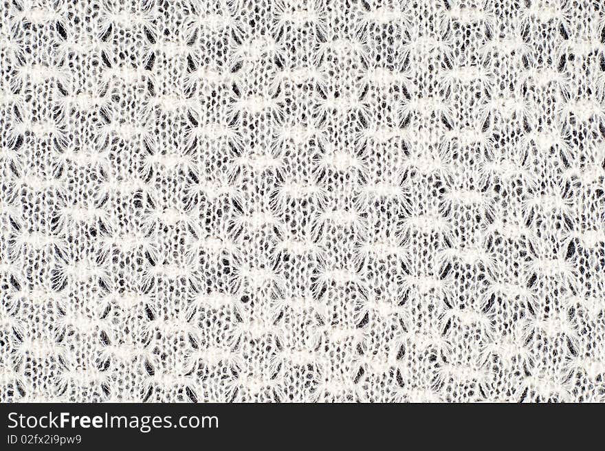 White abstract pattern on black background