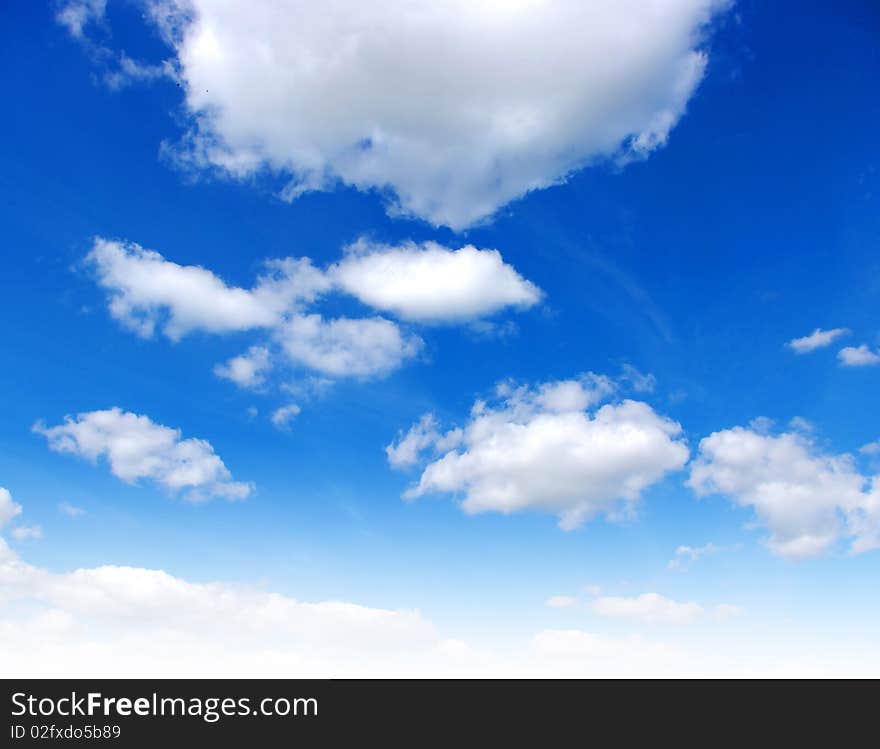 Blue sky background with white clouds