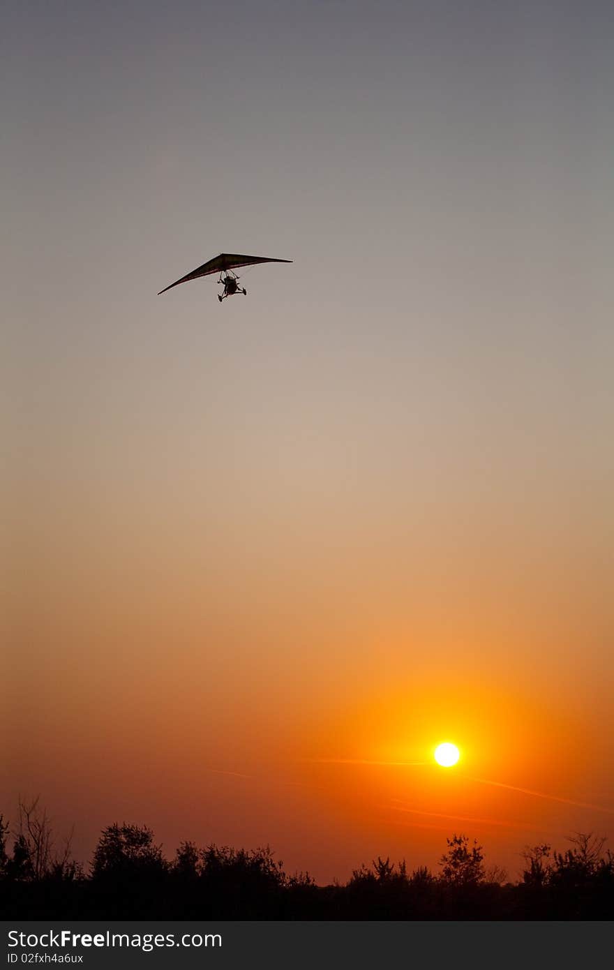 On a clear sunset the whole silence was broken by a noisy glider. On a clear sunset the whole silence was broken by a noisy glider