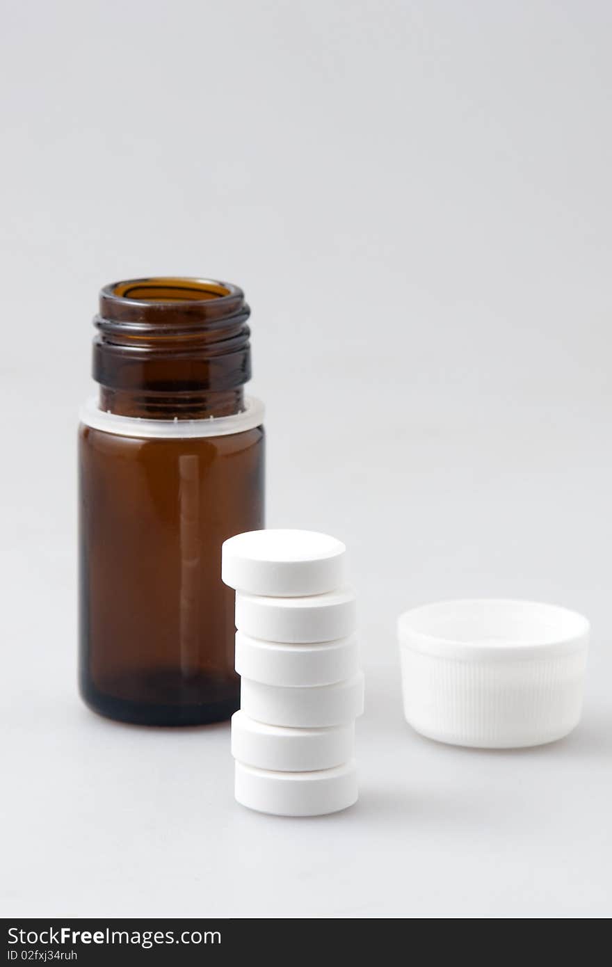 Little vial and tablets