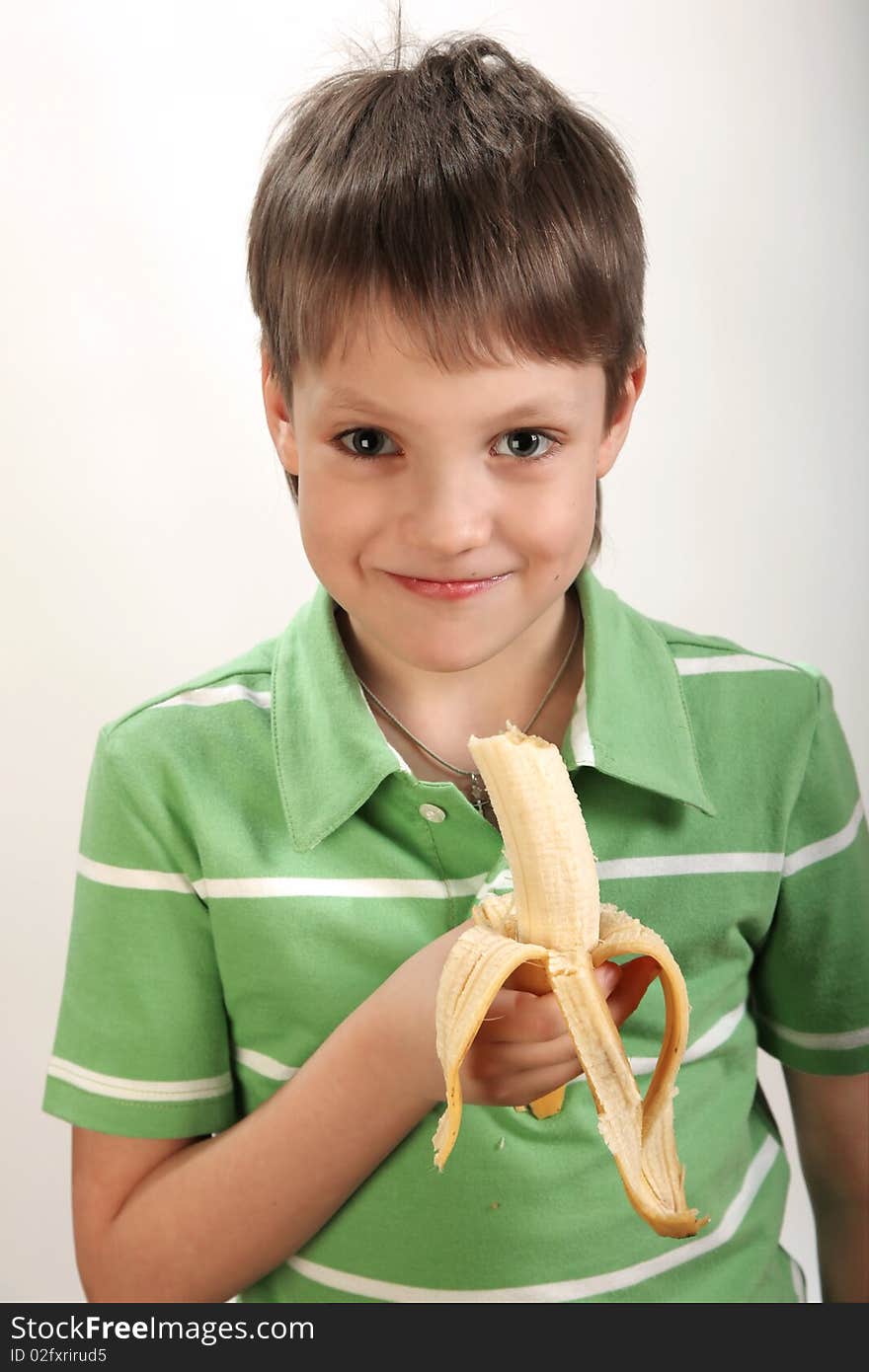 Boy with banana in hands