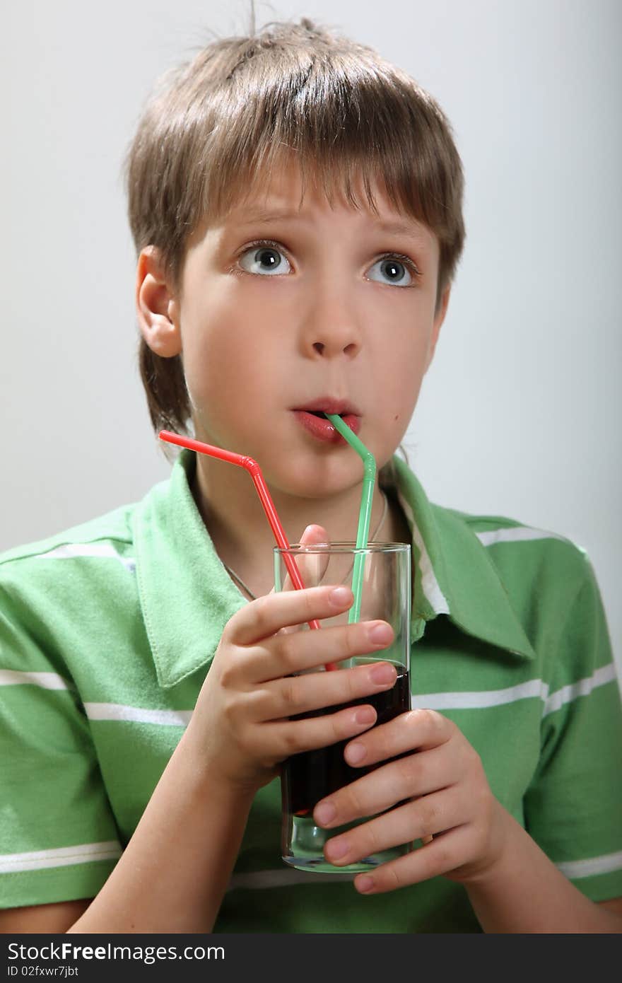 Boy with cocktail looking up