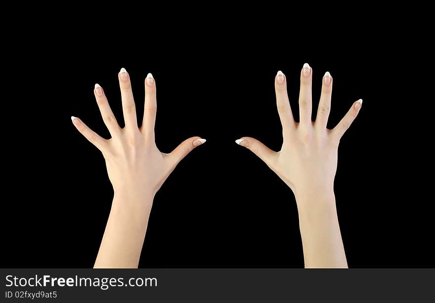 Two woman s hands in darkness