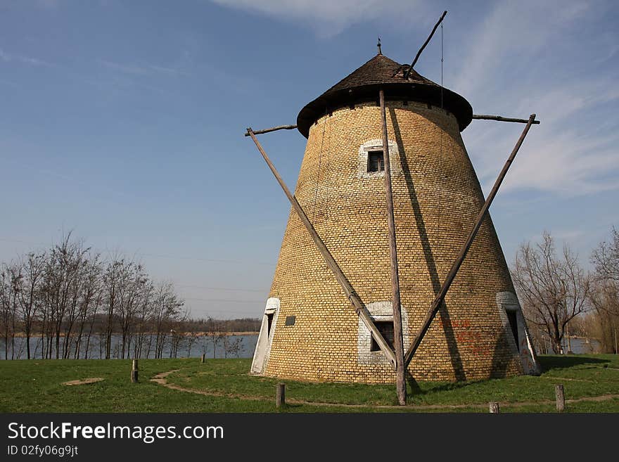 Old windmill on the lake