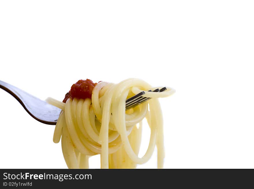 Freshly made spaghetti rolled on fork, isolated on white. Freshly made spaghetti rolled on fork, isolated on white