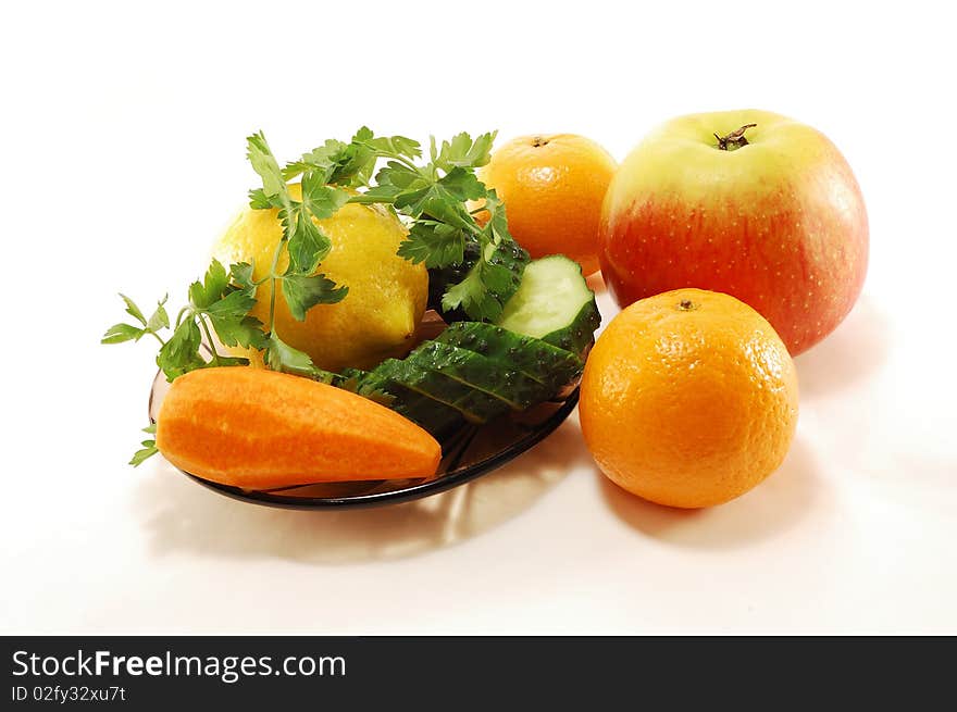 Fruits and vegetables on white background