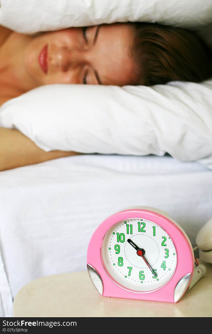 Young beautiful woman lying in the bed. Young beautiful woman lying in the bed