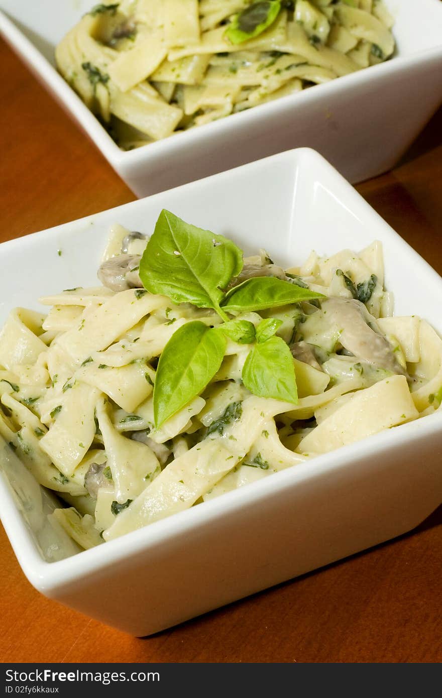 Pasta with pesto and basil