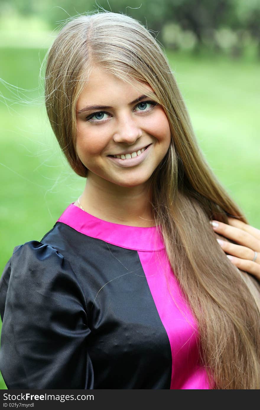 Closeup portrait of young woman outdoor