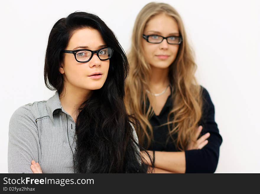 Two young womans, isolated on white background