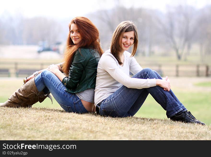 Happy young women on field in summer. Happy young women on field in summer