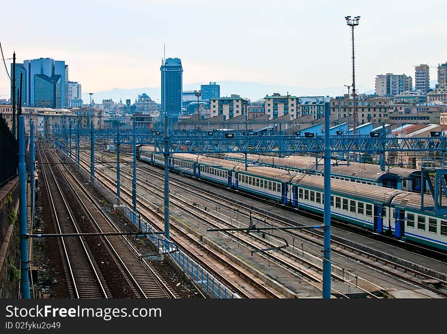 Rail leads to an European city skyline.
This is a view on Genoa downtown through the industrial area with trains and railroads. It shows the busy industrial part of city life. Rail leads to an European city skyline.
This is a view on Genoa downtown through the industrial area with trains and railroads. It shows the busy industrial part of city life.