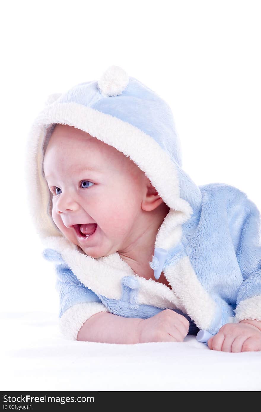 Cute little boyl with a warm coat on white background