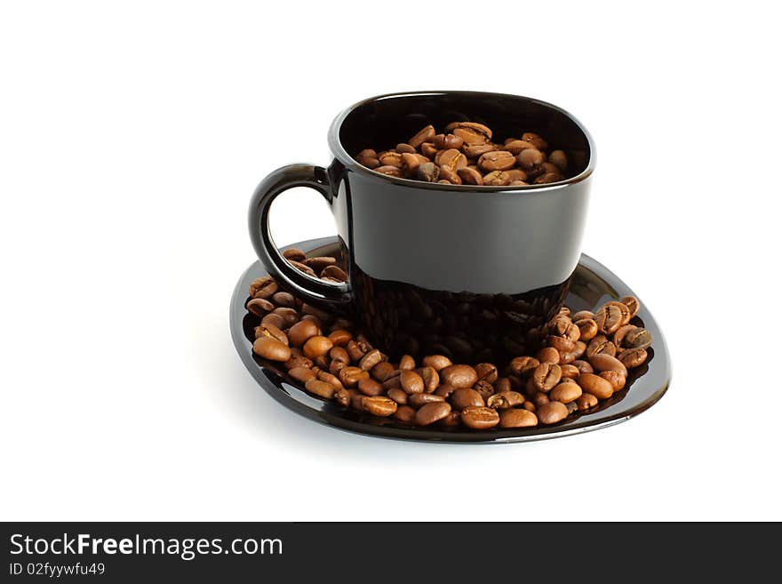 Cup with grain coffee isolated on white background