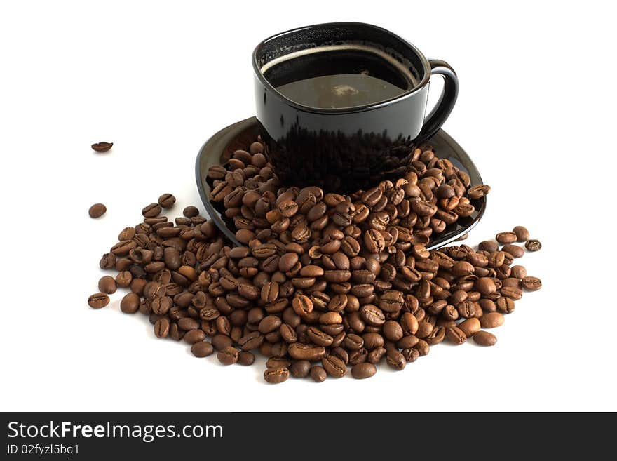 Black cup of coffee and coffee beans isolated on white background