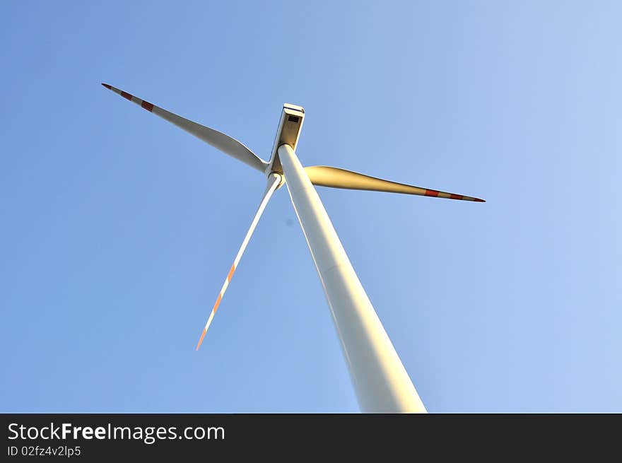 Wind turbine on the clear sky