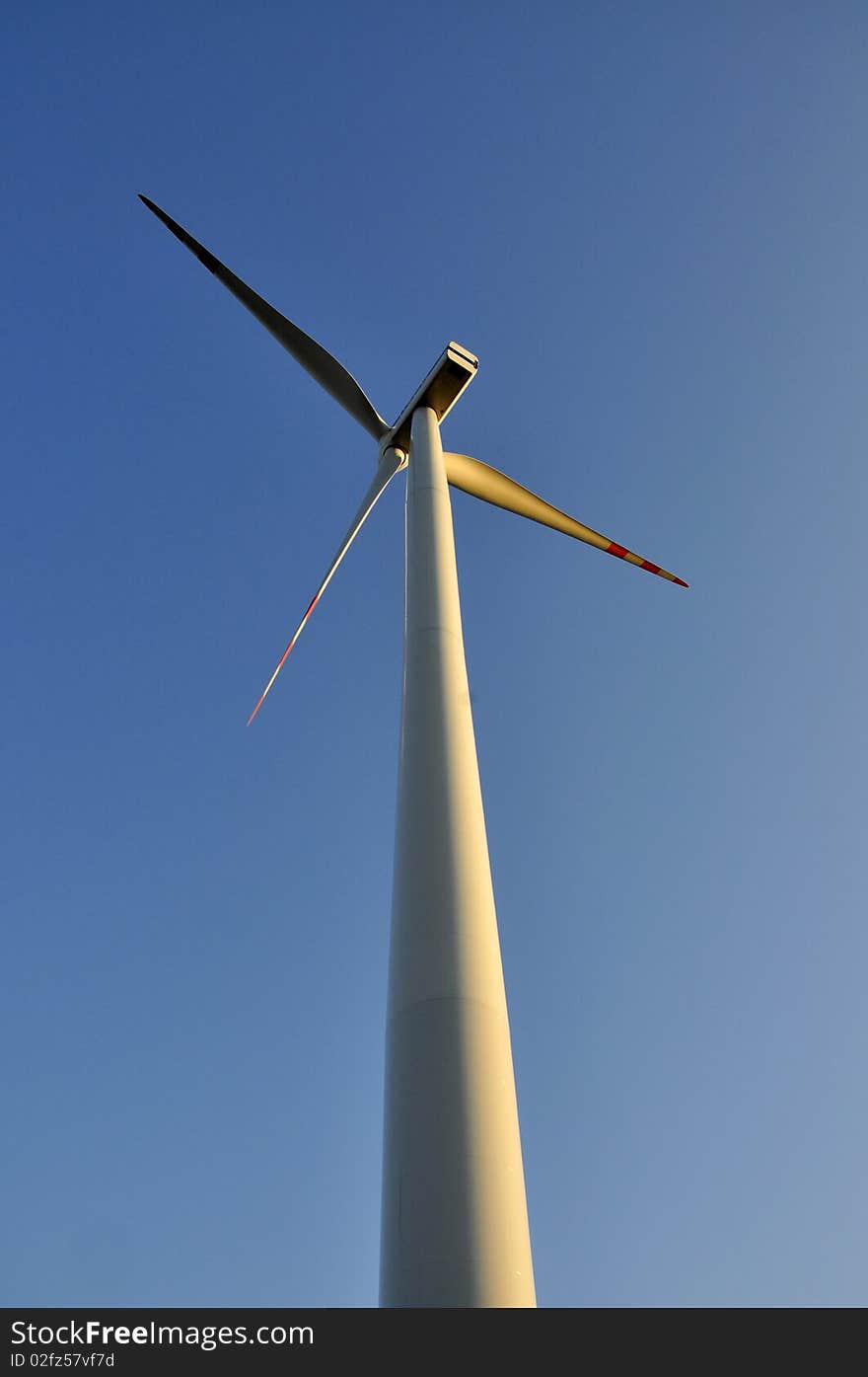 Wind turbine on the clear sky