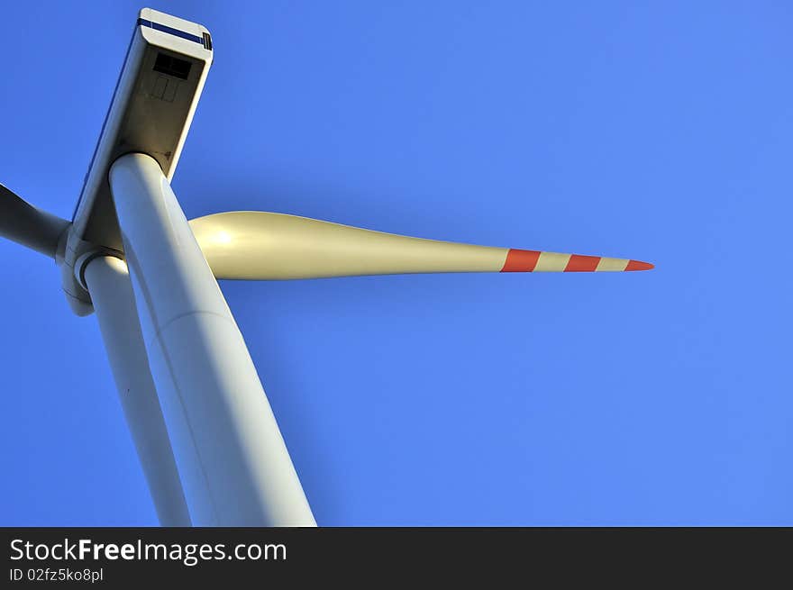 Wind turbine on the clear sky