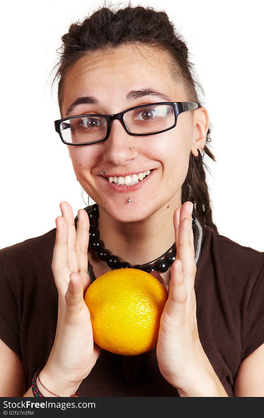 Girl with dreadlocks show an orange, isolated. Girl with dreadlocks show an orange, isolated