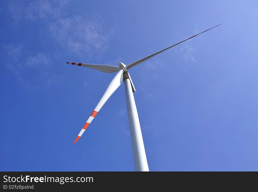 Wind turbine on the clear sky